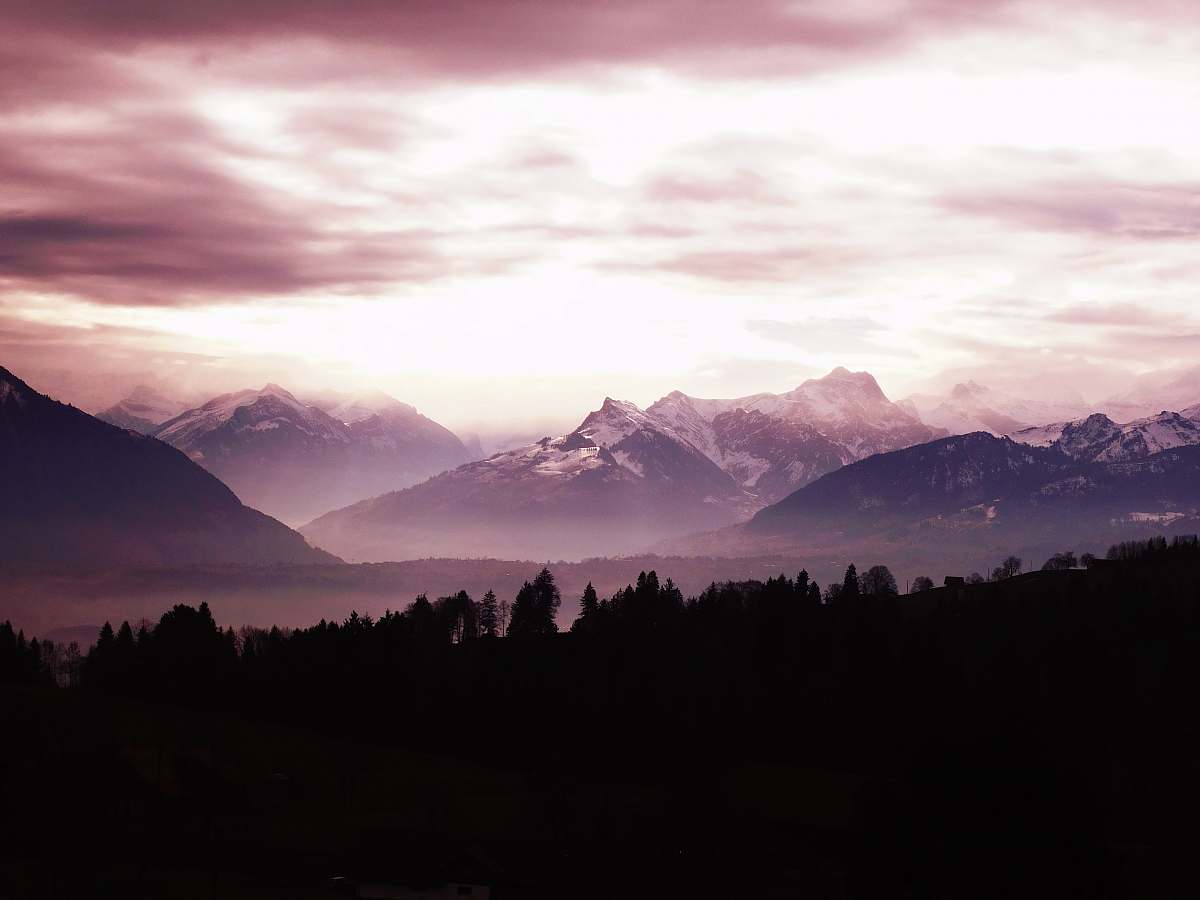 mountain range silhouette of mountain with fog outdoors